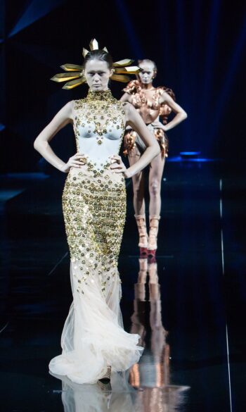 Two models, beautifully dressed. It's all about the material. What matters to you as you grow and develop?