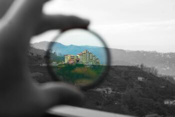 A black and white photo with a lens focussed on one part of the picture, which is now in colour. It's all about providing clarity.