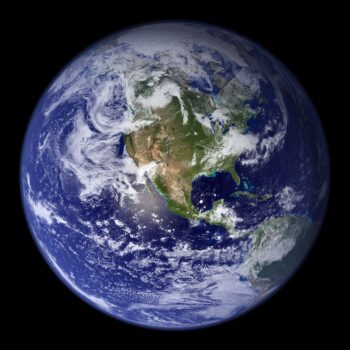 A photo of the earth, taken from space, showing the enormity of the planet and the universe beyond. Ours to create.