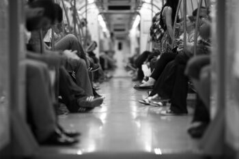 Commuters on a train. Are you happy to be caught in the daily grind for the next 30 years?