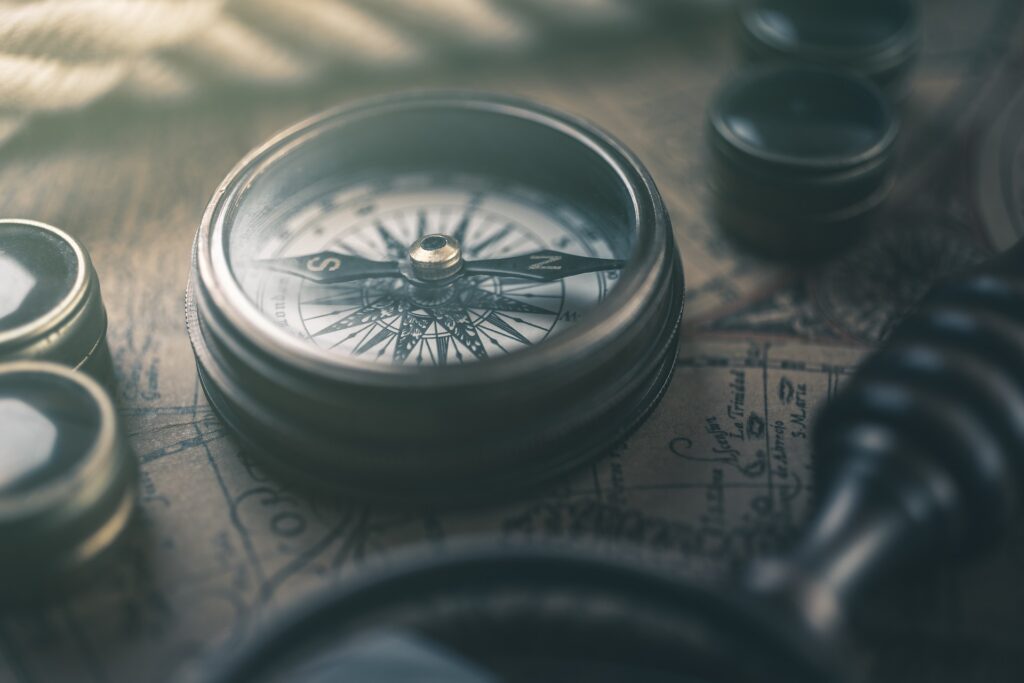 An old-fashioned compass, pointing the right direction. What direction are you taking and do you have a plan?
