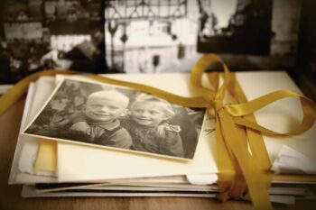 A pile of old photos, memories from the past. What are you carrying from the past?