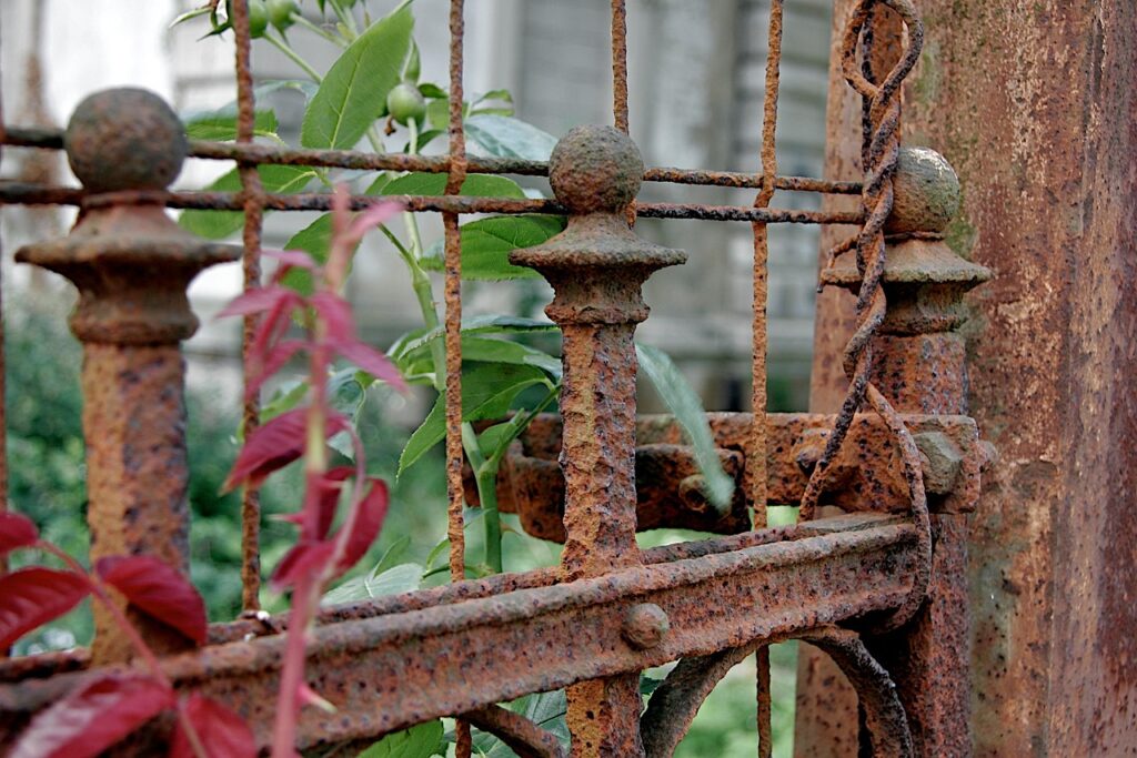 fence Gary K Burns A rusted fence blocking the way. What's getting in your way to success?