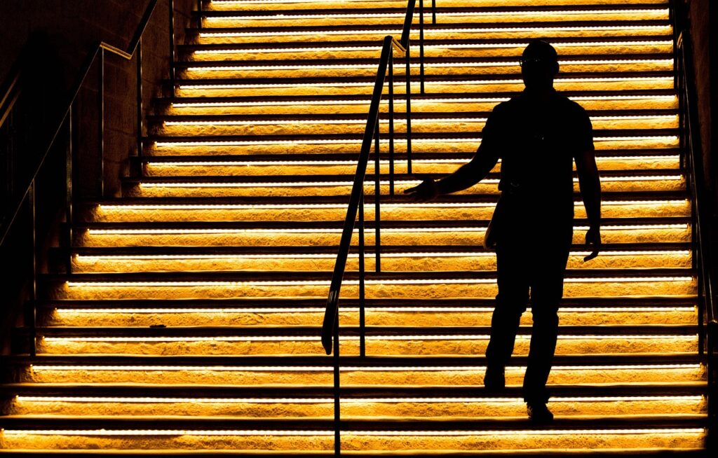 steps Gary K Burns A person walking up golden steps, one step at a time. Make the next exciting step now the one that matters most.