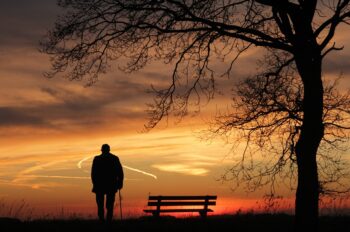 A person looking at the sunset, a silhouette contemplating all that they have done. How's it going for you?