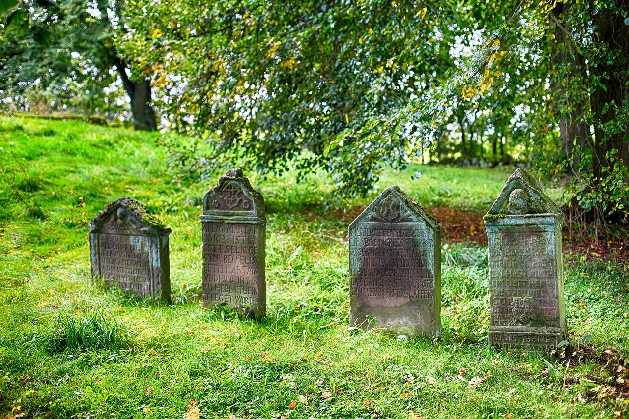 A graveyard. Four headstones. What will they say about you when you die? What do you want them to say?